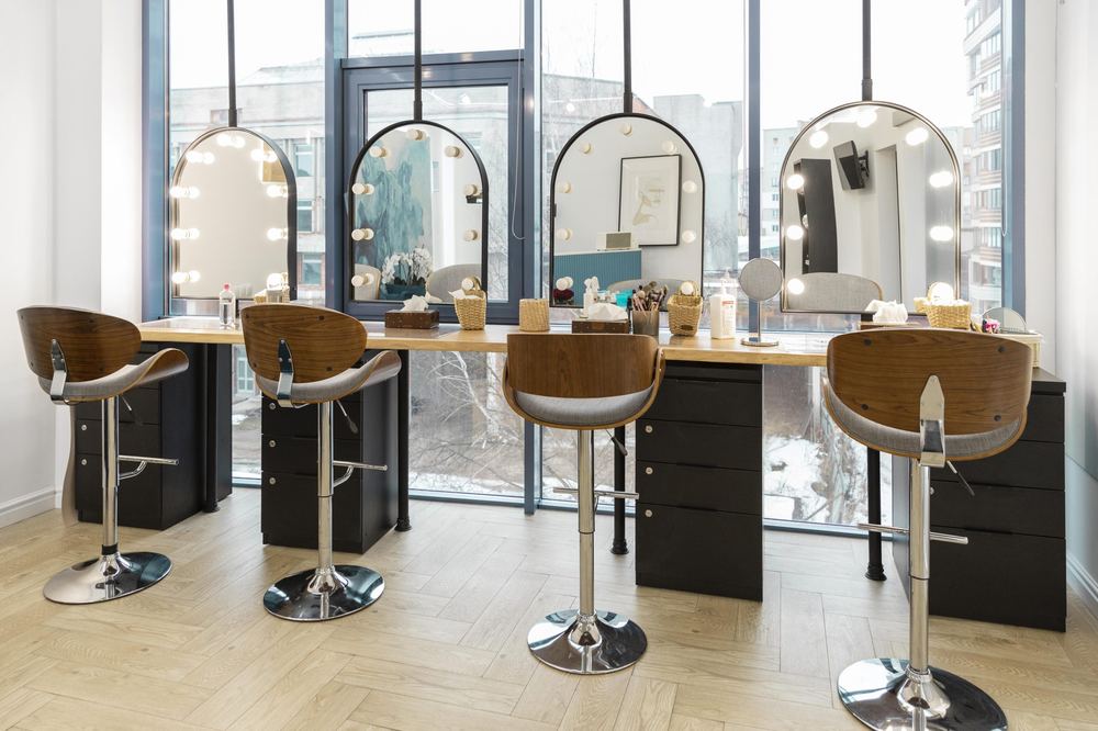 The Lioréa Lounge interior, with soft lighting, mirrors and warm neutral finishes