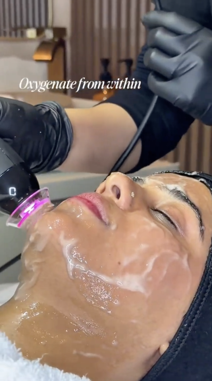 OxyGeneo facial treatment device being used at Lioréa Lounge